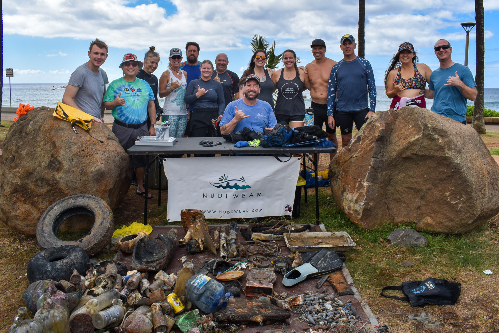 Nudi Wear tackling the issue of marine debris removal at their monthly cleanup dive in Hawaii