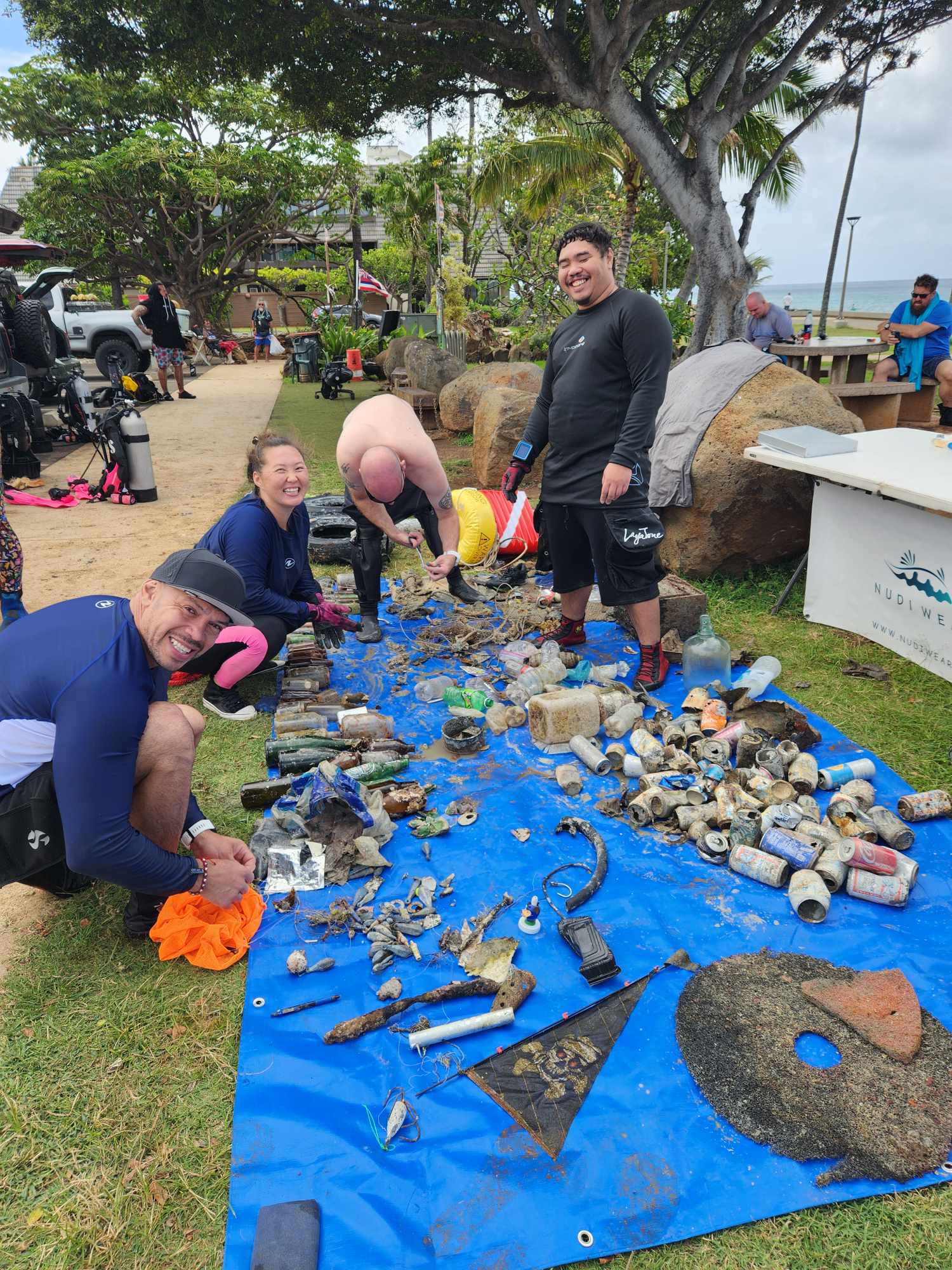 Nudi Wear volunteers sorting through marine debris found at our Adopt The Blue location