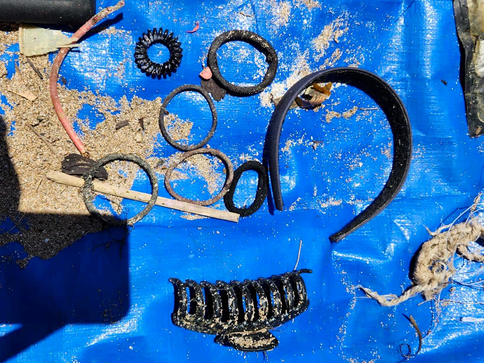 Hair accessories removed from the ocean during the Makaha dive site cleanup