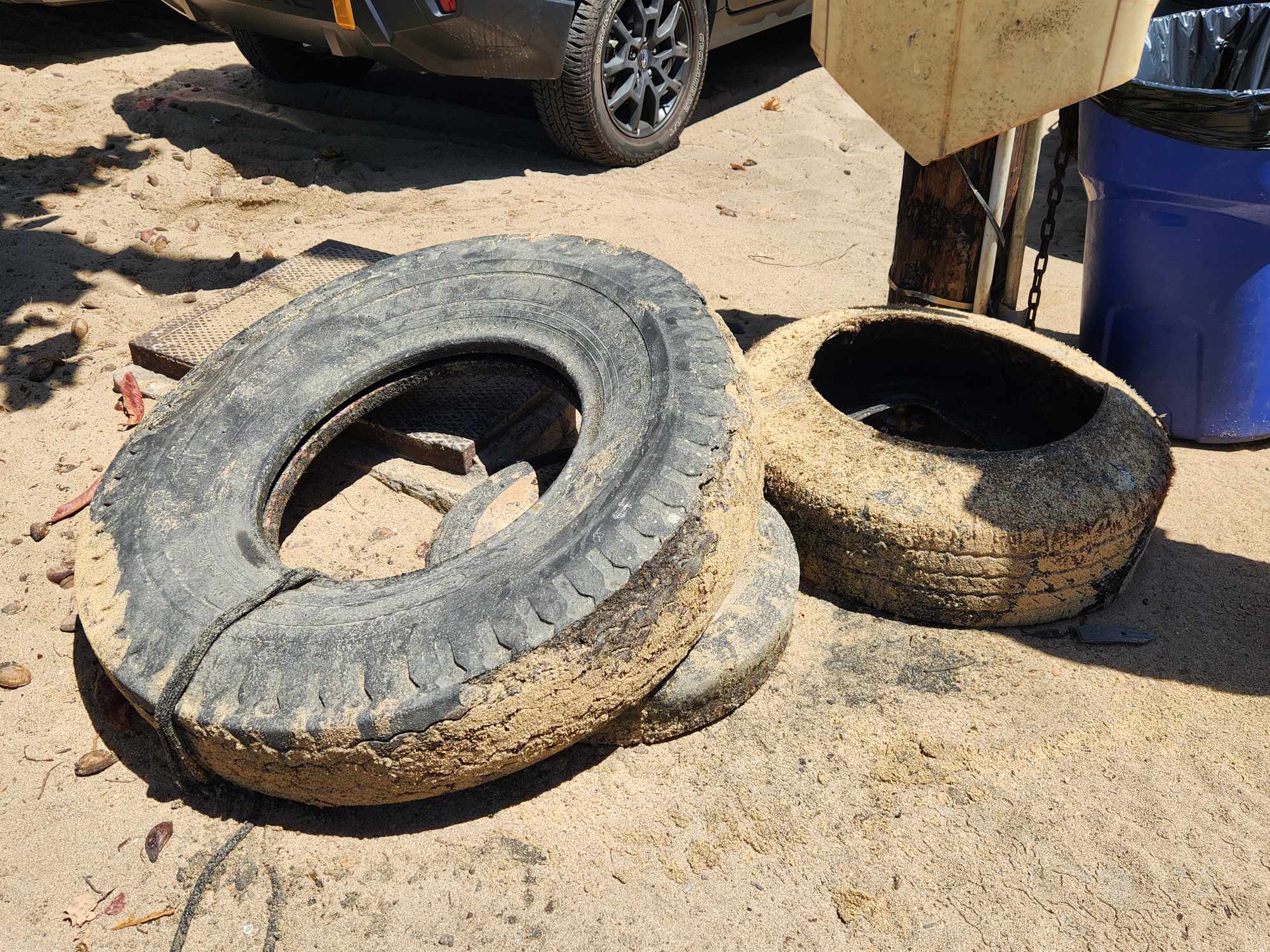 Tires removed from the ocean at Makaha Beach Park