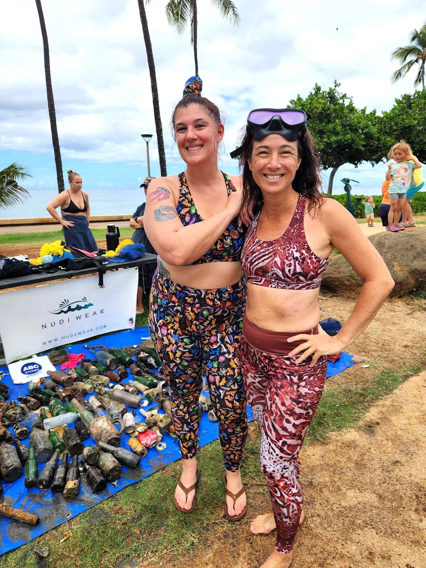 Nudi Wear volunteer divers at a cleanup sporting their Nudi Wear activewear