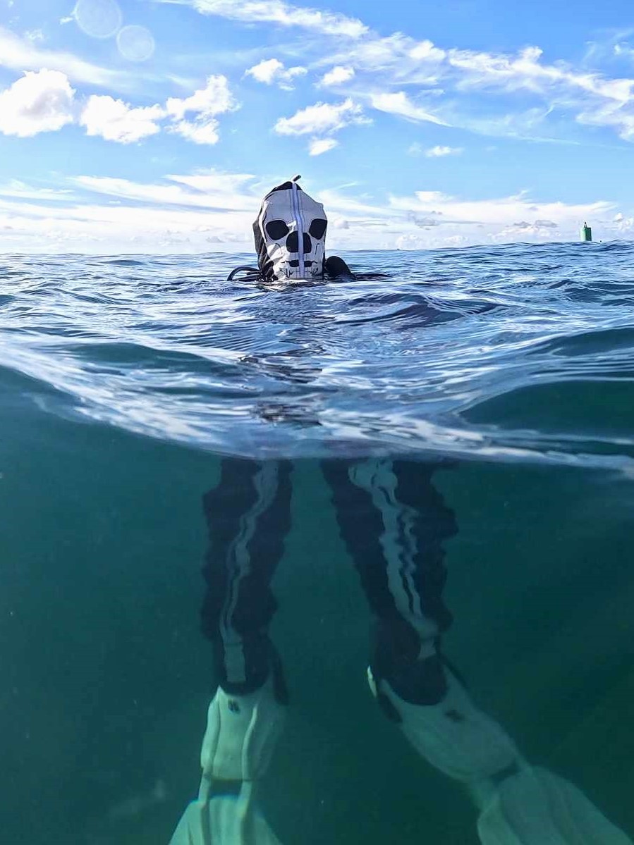 A skeleton descending into the depths at Point Panic during our Halloween Cleanup