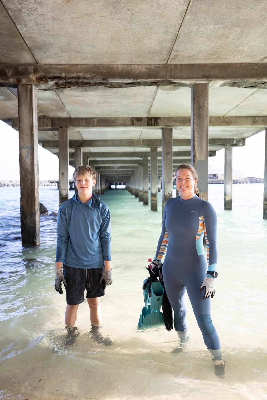 Volunteers under the pier