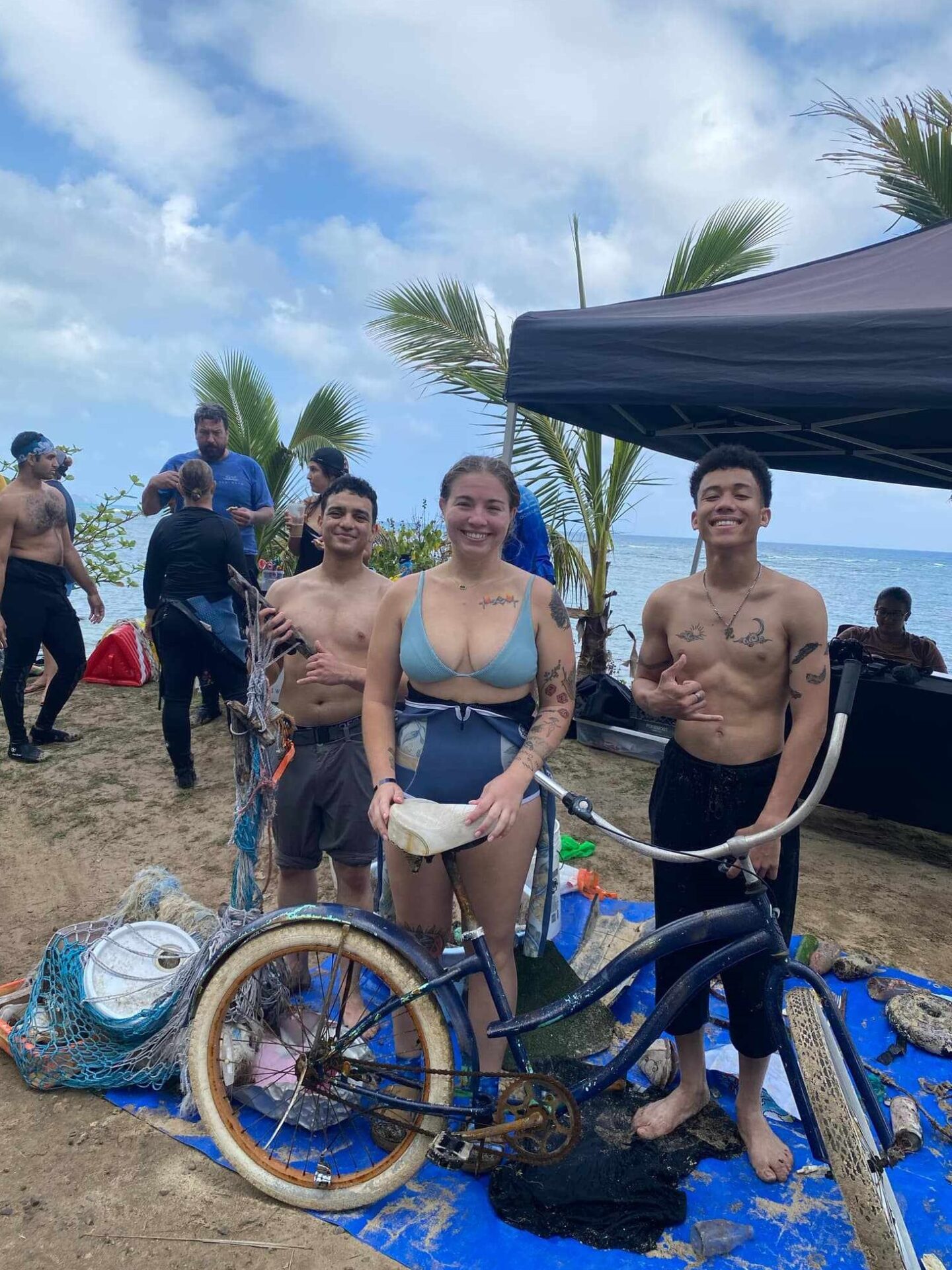 Volunteers with a bike found along the waterline