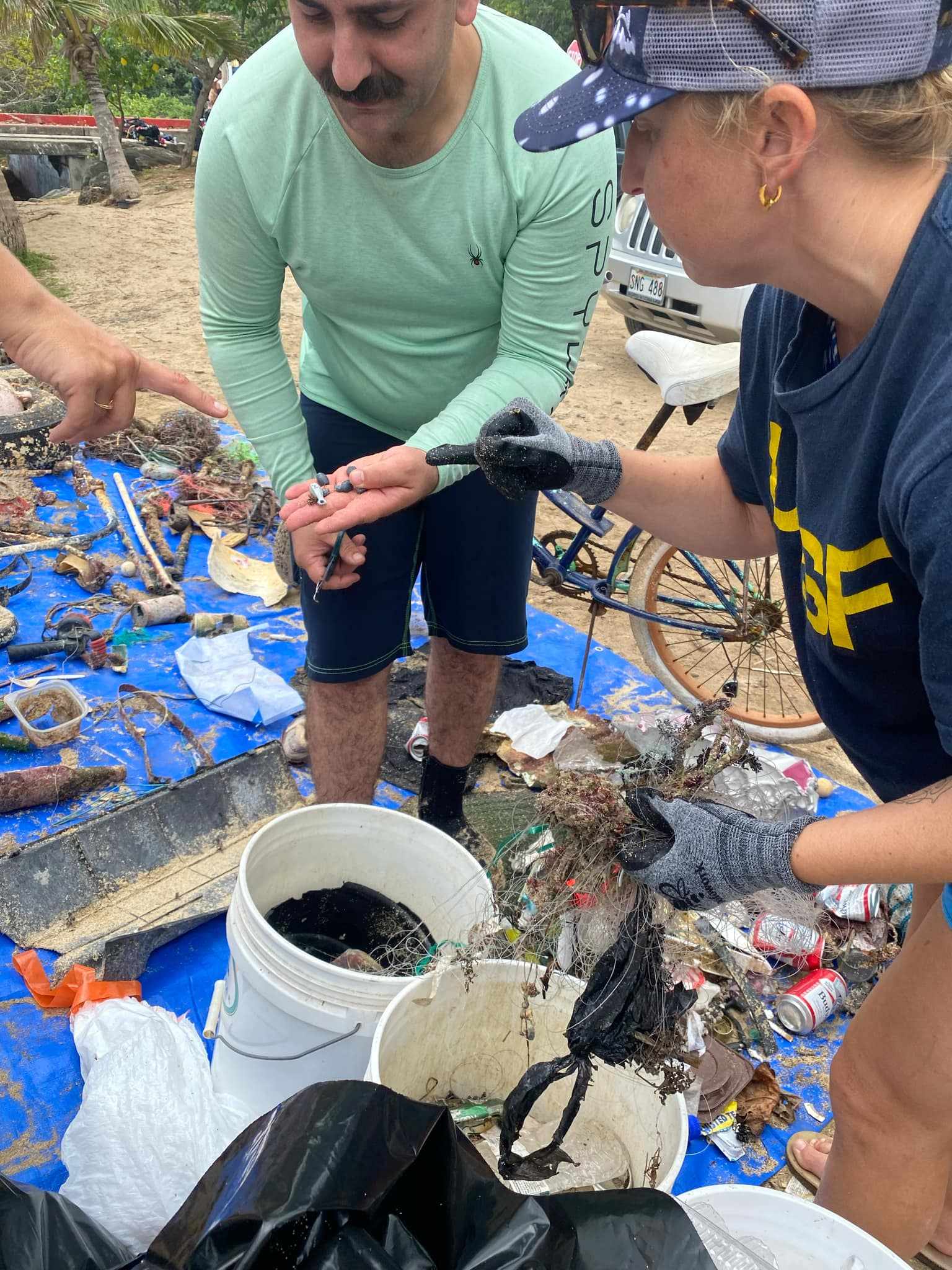 Nudi Wear volunteers sorting fishing waste after the cleanup