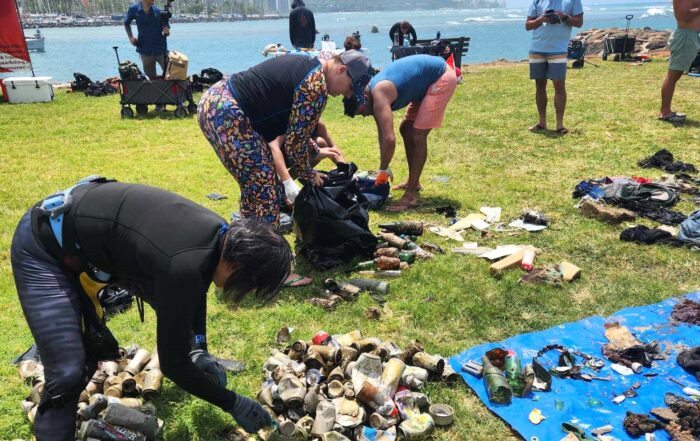 Volunteers sorting the trash to be logged during PADI AWARE cleanups in Hawaii